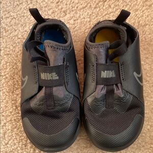 Nike Black Sneakers with Breathable Mesh and Slip-On Design